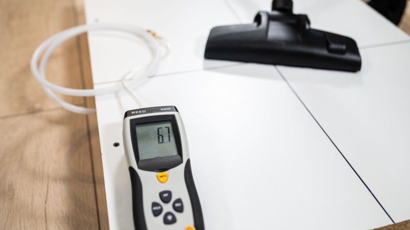 our suction test uses a manometer attached to a hole in a test...