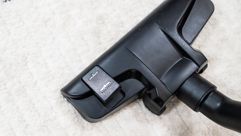 canister vacuum - with just a tap, the bristles on the mighty mite become exposed and...