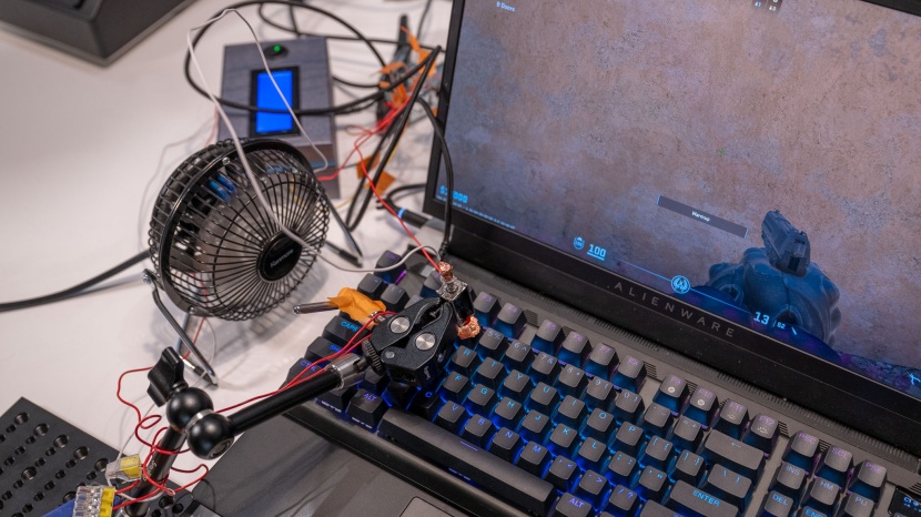 gaming keyboard - we tested latency using a rig consisting of two computers, a...
