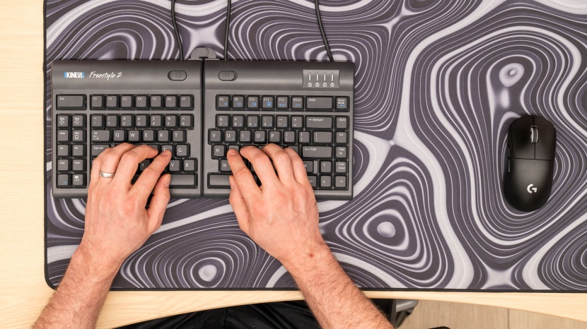 kinesis freestyle2 - the two halves of the keyboard, each with its own spacebar, have...