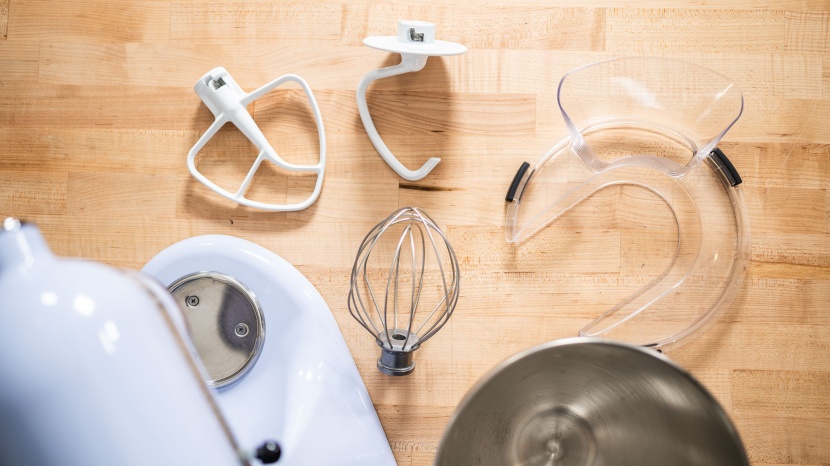 kitchenaid artisan stand mixer - the artisan comes with a flat beater, dough hook, and whisk.