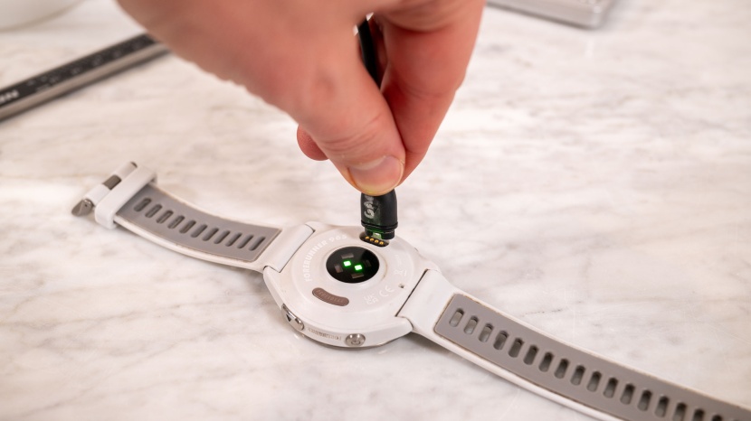 garmin forerunner 965 - the forerunner charges via a magnetic connection with a four-pin cord.