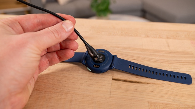 garmin vivoactive 5 - charging is via a magnetic connection with a four-pin port on the...