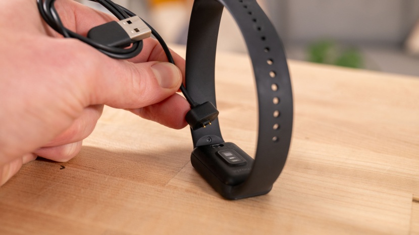 amazfit band 7 - the two-prong connector is simple but works well for charging.