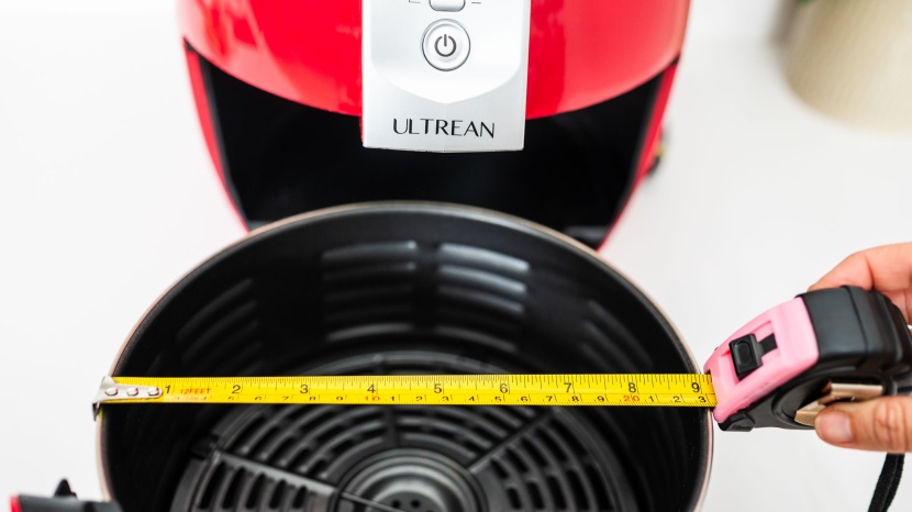 ultrean air fryer - the 8.7-inch basket has good airflow, but limits how food can be...