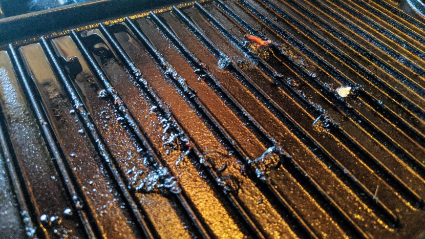 cast iron skillet - the extra texture of grill surfaces can be a pain to clean.