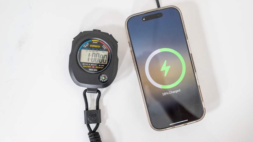 the anker maggo charger, which is underneath the phone, charged our...