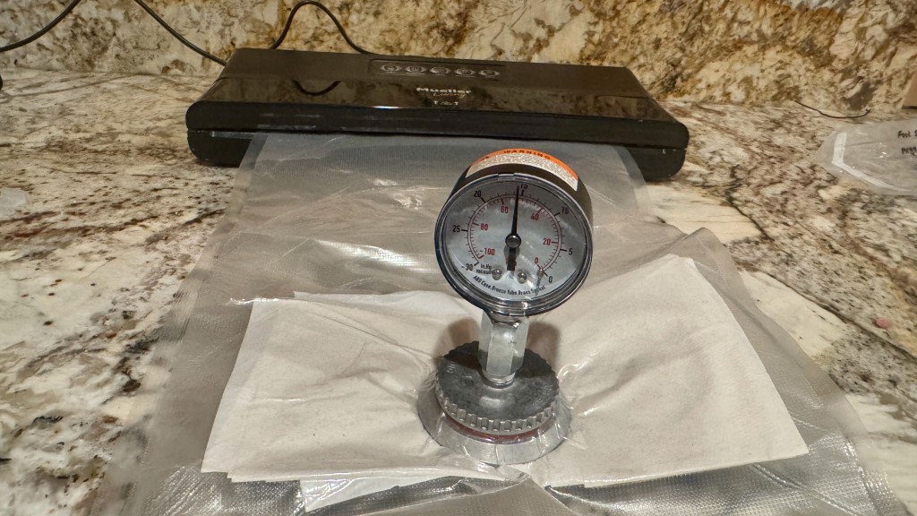 vacuum sealer - a gauge was used to measure how much suction each machine is able to...