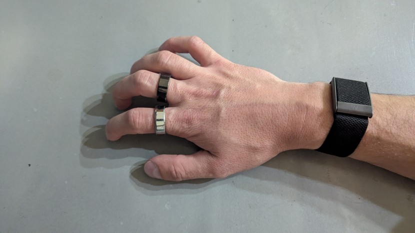 fitness tracker - screenless trackers can come in a variety of styles, like both of...