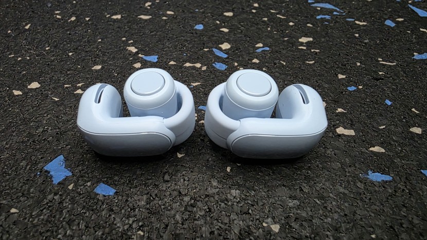 bose ultra open - the clam-like design of the open ultra hugs the outside edge of the...