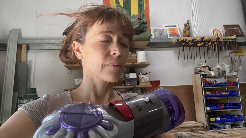 handheld vacuum - the dyson produces a very strong wind which can blow away not only...