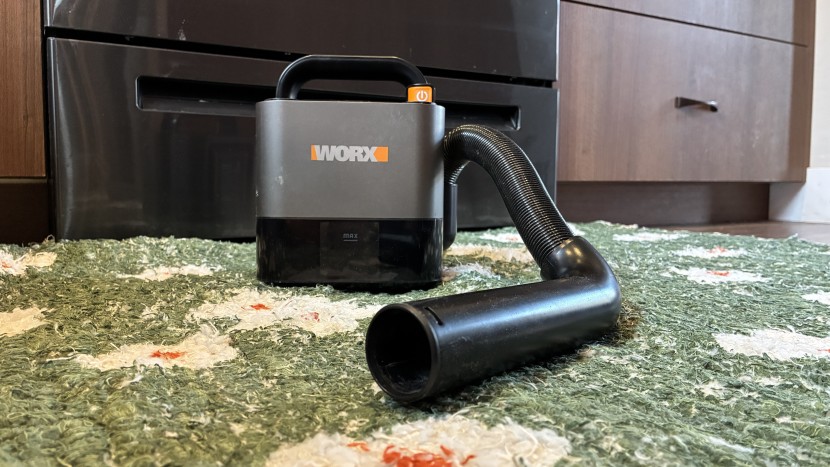 handheld vacuum - it's odd using two hands a first with the worx, but we found we can...