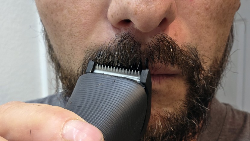 trimming the mustache length to 7mm with an adjustable guard on the...