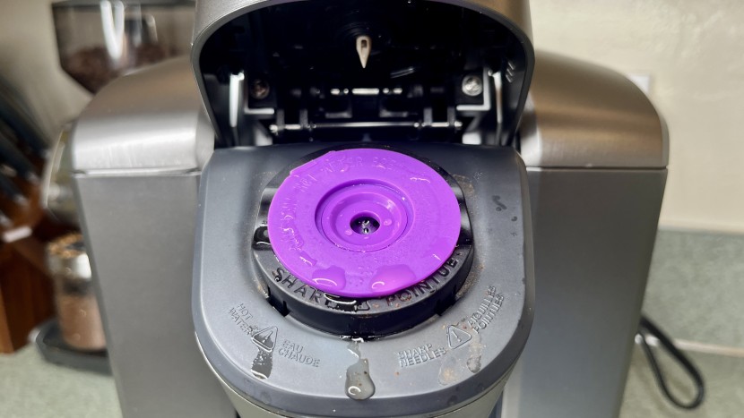 a touch of water and coffee grounds escaped our resusable pod during...