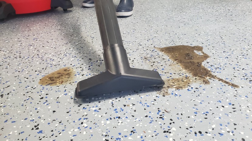 shop vac - the craftsman had enough airflow and suction to clean up wet messes.