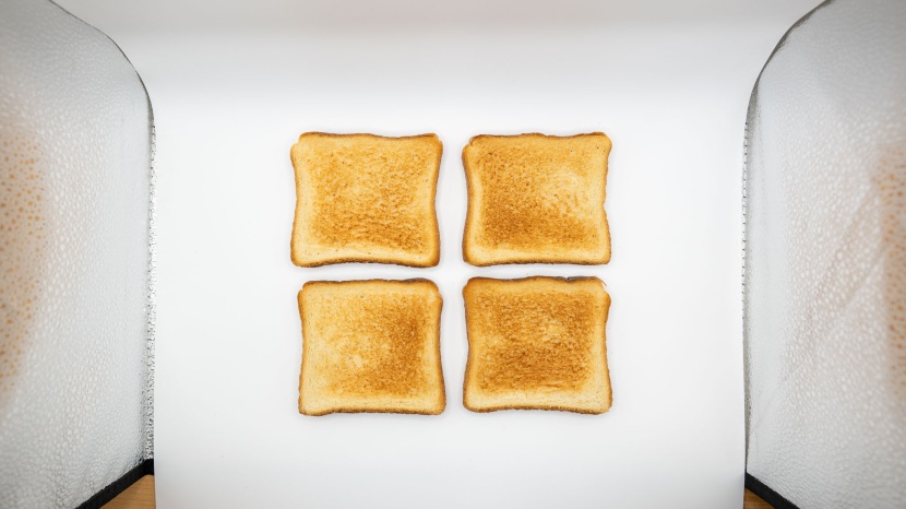 hamilton beach easy reach 4-slice - the back of the oven toasts a bit darker than the front, so we had...