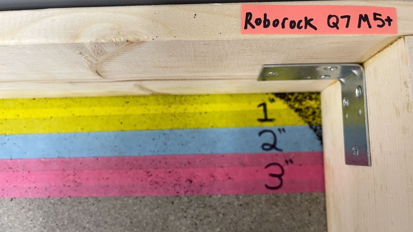 roborock q7 m5+ corner results - some coffee grounds left behind.