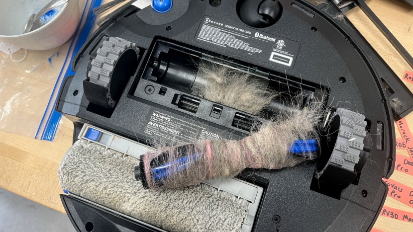 ecovacs deebot x9 pro omni - pet fur and longer hair strands quickly got wrapped around the brush...