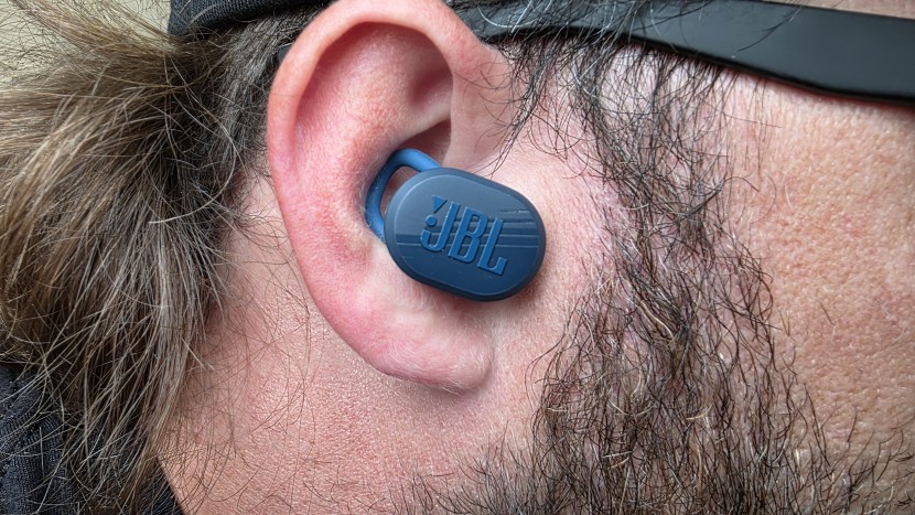workout headphones - up close, you can see that the wing of the jbl endurance is wide and...