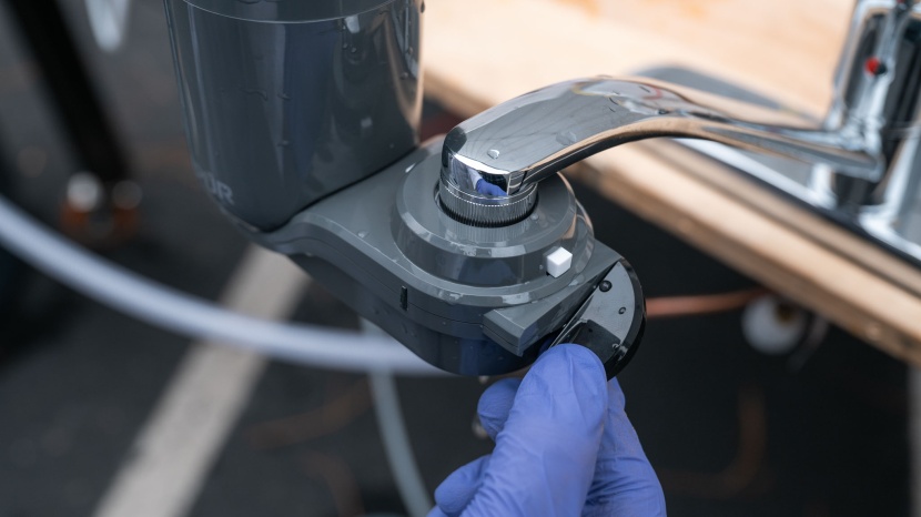 pur plus vertical faucet - a switch on the side redirects the water through the filter whenever...