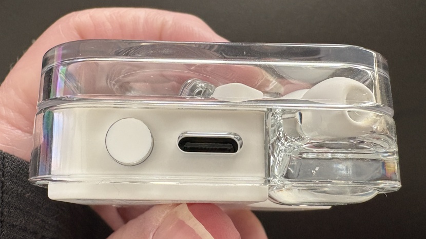 nothing ear wireless - the nothing ear wireless has a pairing button and charging port on...