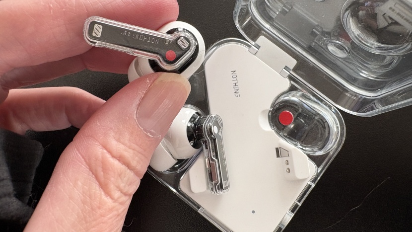 nothing ear wireless - the nothing ear earbuds and their case holes are color-coded for...