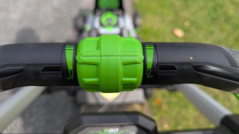 lawn mower - the speed selector is in the middle of the handle on ego models, and...