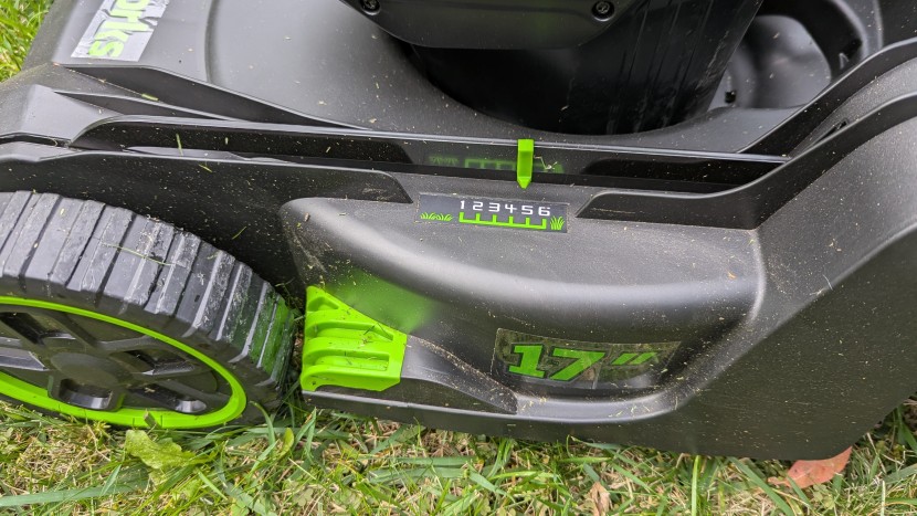 the mowing height setting is clearly indicated on the side of the...