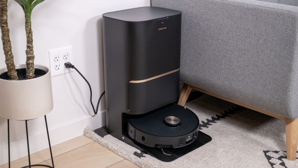 dreame l50 ultra - the dreame l50 ultra rests in its surprisingly sleek dock, which...