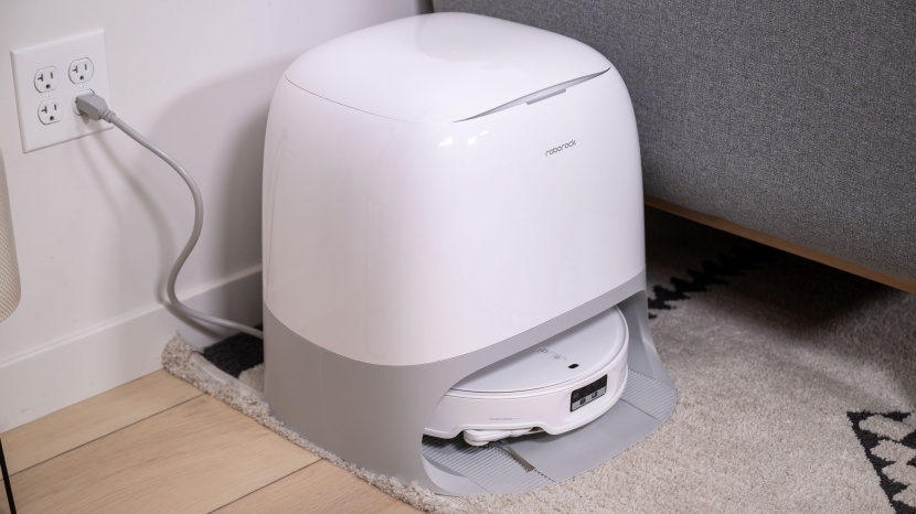 roborock qrevo curvx - the qrevo curvx has a sleek docking station that houses the vacuum...