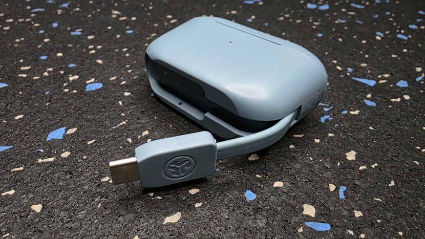 jlab go pop+ - the jlab have a built in charging cord, so there is less to carry...