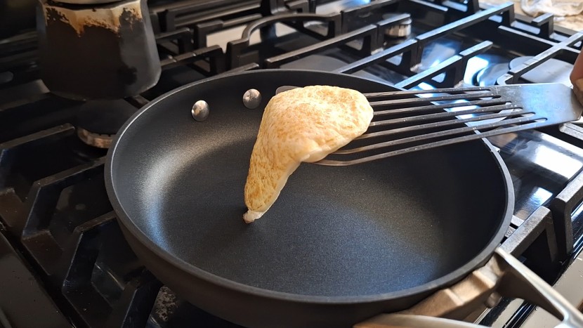 cookware set - the calphalon premier set showing off its nonstick qualities while...